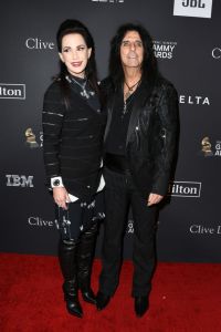 Sheryl Goddard and Alice Cooper (R) attend The Recording Academy And Clive Davis' 2019 Pre-GRAMMY Gala at The Beverly Hilton Hotel on February 9, 2019 in Beverly Hills, California.