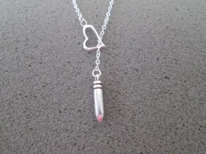 silver "shot through the heart" bon jovi necklace