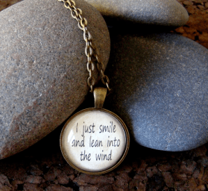 jason aldean necklace with lyrics i just smile and lean into the wind