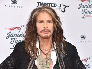 Steven Tyler posing for a photo.