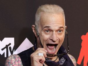 David Lee Roth posing for a photo on the VMA red carpet.