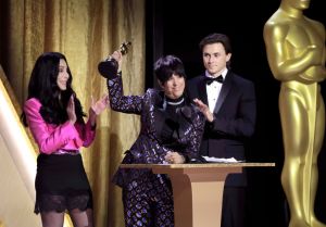 Cher presents Diane Warren with an award onstage during the Academy of Motion Picture Arts and Sciences 13th Governors Awards at Fairmont Century Plaza on November 19, 2022 in Los Angeles, California.