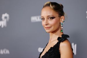 Nicole Richie attends the Baby2Baby 10-Year Gala facing left wearing a black gown.