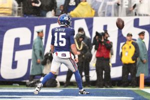 Giants' quarterback Tommy DeVito scores a touchdown at MetLife stadium