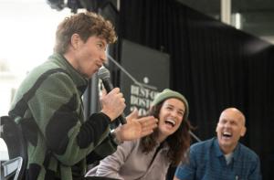 Shaun White interviewed on stage, making crowd laugh at Snowbound Expo