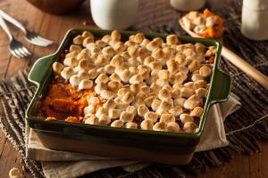 sweet potatoes and marshmallow casserole in a dish