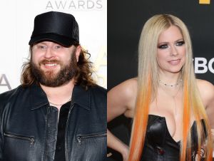 Nate Smith in black hat and jacket, and Avril Lavigne in a black dress