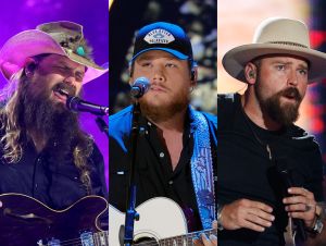 Chris Stapleton performing on stage on black shirt and cowboy hat, Luke Combs performing on stage in black shirt and ball cap and Zac Brown on stage wearing a tan hat and black shirt