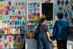 People waiting for ice cream at an ice cream truck