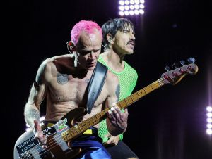 Bassist Flea (L) and singer Anthony Kiedis of Red Hot Chili Peppers perform at Allegiant Stadium on April 01, 2023 in Las Vegas, Nevada.