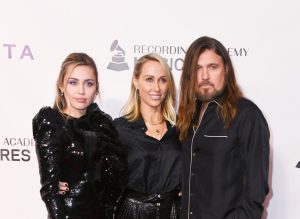 Miley Cyrus, Tish Cyrus and Billy Ray Cyrus attend MusiCares Person of the Year honoring Dolly Parton