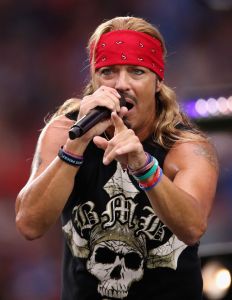 Bret Michaels performs during a half-time show at the NFL game