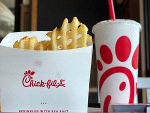 a Chick-fil-A meal is displayed at a Chick-fil-A restaurant, fries and a drink