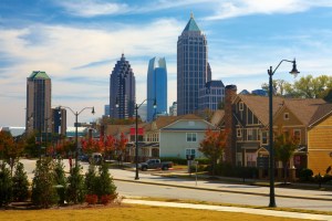 Houses and cars against the midtown. Atlanta, GA.