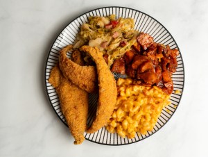 Fried fish platter with side dishes