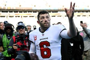 Baker Mayfield #6 of the Tampa Bay Buccaneers waves to fans after the game