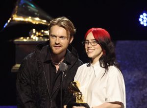 FINNEAS and Billie Eilish accept the "Song Written for Visual Media" award for "What Was I Made For?" onstage during the 66th GRAMMY Awards