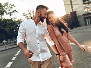 Couple walking down the street