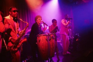 The Pinky Ring Janelle Monae on stage with The Hooligans