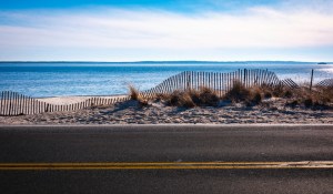 Tranquil seascape of Shore Road on Cape Cod, Massachusetts during a spring road trip.