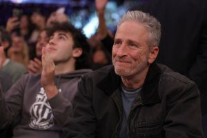 Jon Stewart courtside at a Knicks Game. Jon Stewart recently shared the news of his dog Dipper passing