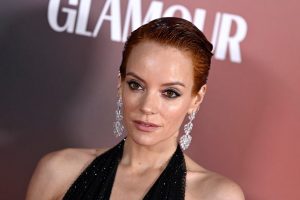 Lily Allen attends the Glamour Women of The Year Awards 2023 wearing a black halter dress and dangly earrings and red hair, Lily Allen Says Having Kids 'Ruined' Her Pop Career.