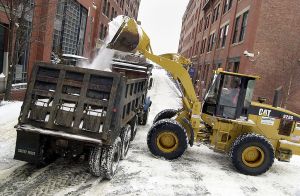 Frontloader doing work. How do you stop a stolen frontloader? A second frontloader!