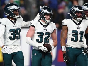 Reed Blankenship #32 of the Philadelphia Eagles celebrates an interception with Eli Ricks #39 during the second quarter in the game against the New York Giants at MetLife Stadium on January 07, 2024