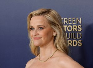 Reese Witherspoon attends the 30th Annual Screen Actors Guild Awards smiling facing right, Reese Witherspoon's 6 Most Iconic Roles Of All Time.