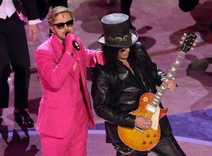 (L-R) Ryan Gosling and Slash perform 'I'm Just Ken' from "Barbie" onstage during the 96th Annual Academy Awards at Dolby Theatre on March 10, 2024 in Hollywood, California.