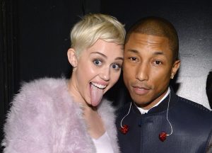 Miley Cyrus and Pharrell Williams attend the 56th annual GRAMMY Awards Pre-GRAMMY Gala