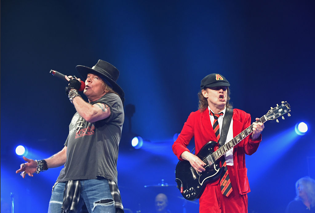 Singer Axl Rose (L) and guitarist Angus Young of AC/DC perform during the AC/DC Rock Or Bust Tour at Madison Square Garden on September 14, 2016 in New York City.