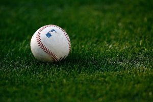 Baseball sitting on a baseball field, list of greatest baseball movies