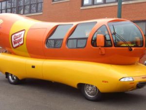 An Oscar Mayer Wienermobile is parked