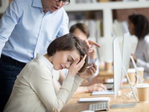 Angry irritated company boss reprimanding employee female, accusing of serious mistake and bad work. Young crying woman worker listening yelling from executive manager feels guilty frustrated unhappy, gaslighting at work concept