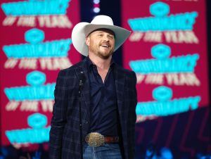 Cody Johnson Revealed A Tattoo - Cody won a CMT award in 2023 in a black jacket and a cowboy hat.