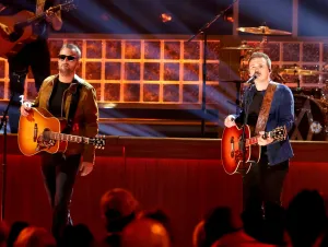 Morgan Wallen Could Spend Six Years In Prison - Eric Church and Morgan both wearing black and performing together at the 2023 CMA Awards.