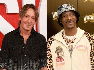 Keith Urban Collaborates With Snoop Dogg - Keith wearing black on a red carpet and Snoop in a white jumpsuit and black hat.