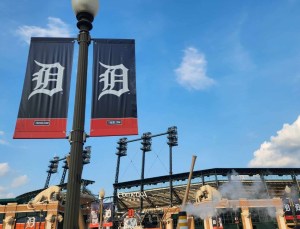 Close up of Detroit Tigers sign in front of Comerica Park and across the street from The District Detroit, ahead of opening day