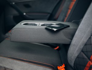 Mobile phone in the modern hatchback car armrest , Uber lost and found