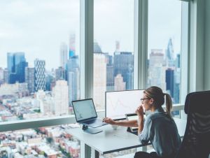 Woman working in New York City. If you've ever wondered what kind of income you need to make in major U.S. cities to live comfortably, we have your answer.