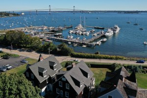 Aerial photo of Marina and bridge in Newport, Rhode Island. New England hotel the harbor island resort just opened this spring.