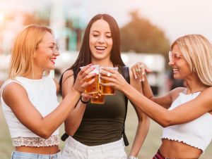 Three ladies at a concert.