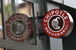 Chipotle logo outside building, a Chipotle employee was shot by a customer