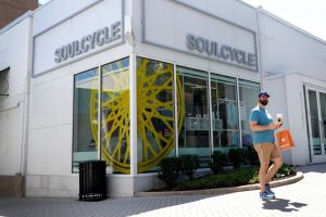 A SoulCycle location storefront on a sunny day. Massachusetts SoulCycle includes 3 locations.