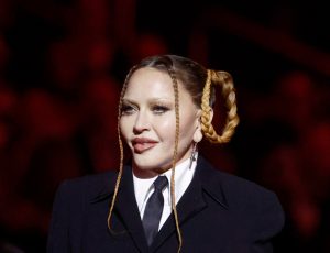 Madonna speaks onstage during the 65th GRAMMY Awards, Madonna Loves Touring With Her Kids.