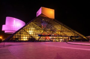 A general view of the Rock & Roll Hall Of Fame Lit in CARE Colors for International Day of The Girl at the Rock & Roll Hall of Fame and Museum on October 11, 2023 in Cleveland, Ohio.