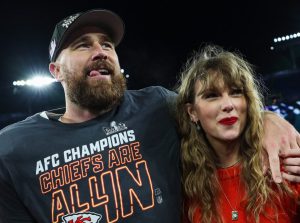 Travis Kelce #87 of the Kansas City Chiefs celebrates with Taylor Swift after defeating the Baltimore Ravens in the AFC Championship Game, How Travis Kelce Landed Taylor Swift.