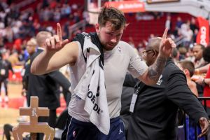 Luka Doncic #77 of the Dallas Mavericks jogs to the locker room after defeating the Houston Rockets. He was part of the most bizarre sports occurrences of the week.