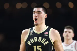 Zach Edey #15 of the Purdue Boilermakers reacts in the first half against the Connecticut Huskies during the NCAA Men's Basketball Tournament National Championship game at State Farm Stadium. This story is about where Purdue's Zach Edey could fall in the NBA Draft.